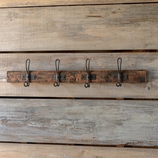 COAT HANGER OF RUSTIC WOOD AND IRON
