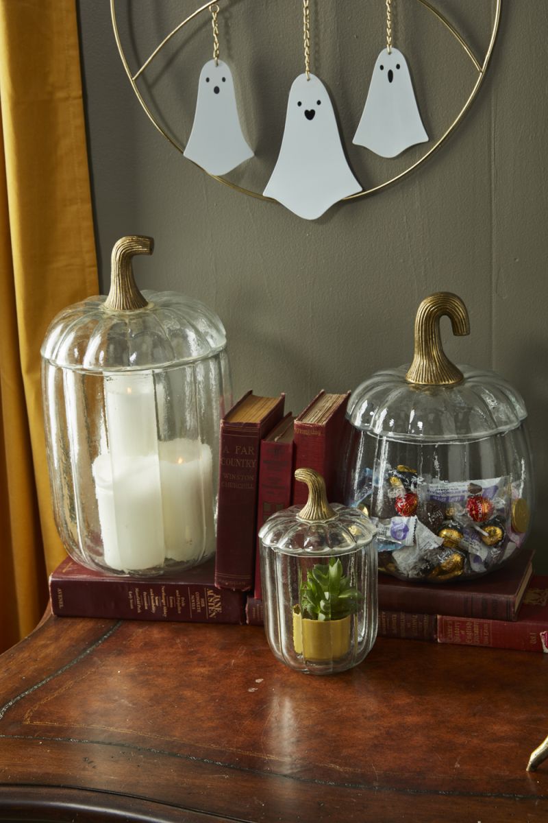 TRANSLUCENT PUMPKIN TERRARIUM from Evolution Home Decor is perfect for storing your holiday treats or to hold a candle to light the room with cool shadows.